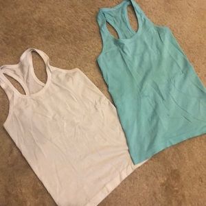 2 Lululemon run swiftly tanks! Size 4